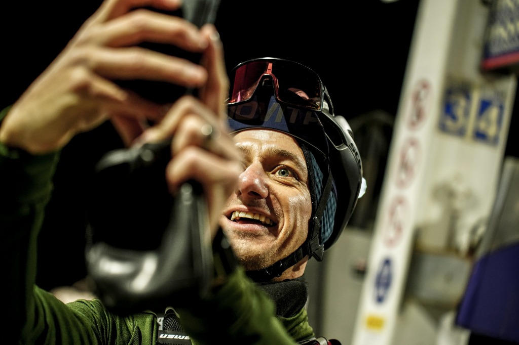 Riders planning route on phone